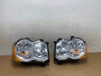 Juego de faros halógenos izquierdo+derecho Jeep Grand Cherokee 2009-2010 V3488 DW Foto 1 de 4