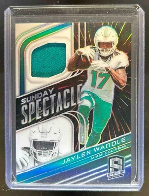 2022 Spectra Jaylen Waddle Sunday Spectacle Jersey Hyper #48/75 Dolphins - Image 1 of 2