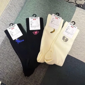 KAWS x UNIQLO Socks 4 Pairs Embroidered Banana & Character Black White - Picture 1 of 2