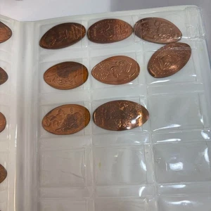Lot of 82 Tokyo Disney Resort Elongated Pressed Penny Coins Album Set - Picture 1 of 11