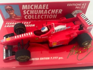 1:43 Minichamps Ferrari 1997 Launch Version M. Schumacher #510974395 - Afbeelding 1 van 3