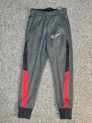 Pantalones de fútbol Nike Dri-FIT Academy tejidos para niños CT1913-013 gris/rosa talla XS-3XL Foto 1 de 3