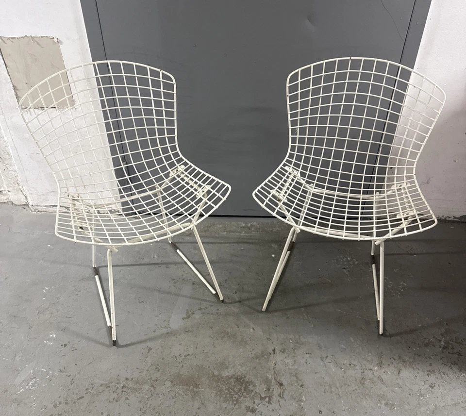 Par AUTÉNTICAS SILLAS LATERALES DE CABLE Early KNOLL Harry BERTOIA cromadas blancas Foto 1 de 4