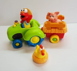 Mattel Sesame Street Singing Elmo Fun Animal Sounds Tractor (2000) - Picture 1 of 6