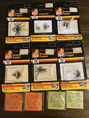 Raro De Colección NUEVO Señuelo de Pesca de Mosquitos SouthBend Rayas Poppers Lote de 7 Ojales Foto 1 de 4