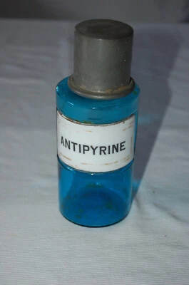 Ancien Pot à Pharmacie en verre bleu. Etiquette en Porcelaine  antipyrine - Photo 1/3