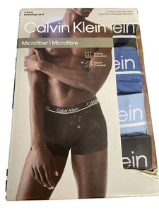 NwT Calvin Klein MEN's (X-LARGE) 4-PACK Low Rise Trunks NP2446O-450 Microfiber - Picture 1 of 4