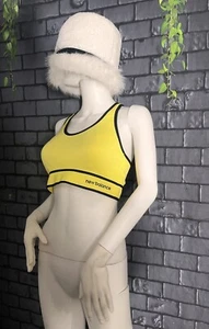 Sujetador deportivo New Balance acolchado espalda cruzada amarillo y negro talla XL para mujer - Imagen 1 de 4