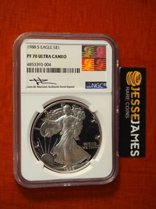 1988 S PROOF SILVER EAGLE NGC PF70 ULTRA CAMEO JOHN MERCANTI SIGNED REAGAN LABEL - Picture 1 of 2