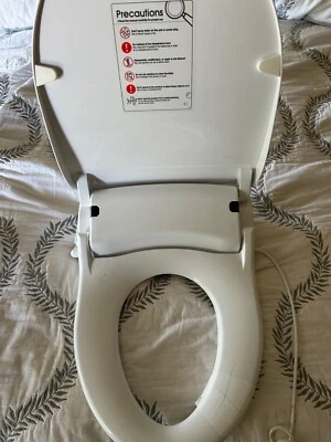 Сиденье унитаза BioBidet U770 с теплой стиркой/сухой и ручным пультом дистанционного управления. - Изображение 1 из 4