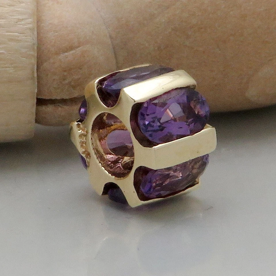 Anhänger Läufer mit Amethyst Besatz in 375/9K Gelbgold - Bild 1 von 4