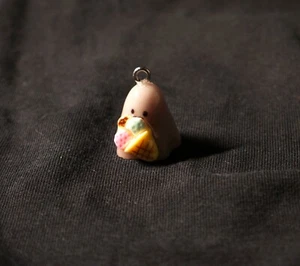 Cute ghost enjoying an ice cream cone - Picture 1 of 2