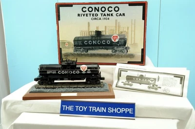 K-LINE 639104 CONOCO 1934 RIVETED TANK CAR BANK. O GAUGE. FULLY OPERATIONAL-NIB. - Image 1 of 4
