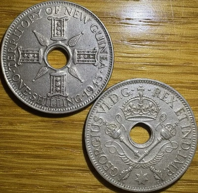 Moneda de plata de 1 chelín de Nueva Guinea Británica 1945 Foto 1 de 2