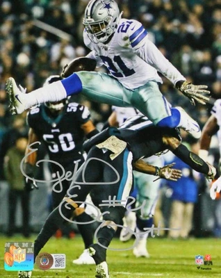 Foto autografiada por Ezekiel Elliott de los Dallas Cowboys 8x10 saltando-Beckett con holograma Foto 1 de 2