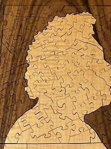 Wood Puzzle Set In A Block Of Wood , Silhouette Of Mozart ? Hand Made ?