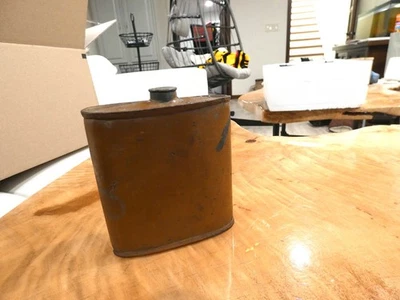 Antigua lata de polvo negro Foto 1 de 4