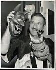 1961 Press Photo Smith Tower co-owner Sanford Brandmarker with Japanese masks