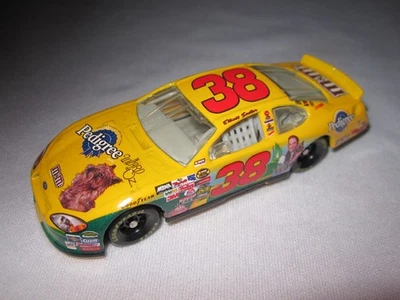 Elliott Sadler #38 Pedigree The Wizard of Oz Taurus NASCAR 1:64 - Image 1 of 4