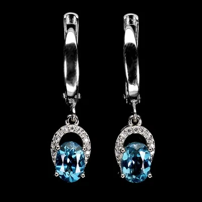 Pendientes de plata de ley 925 ovalados topacio azul Londres 7x5 mm joyas de piedras preciosas Foto 1 de 4