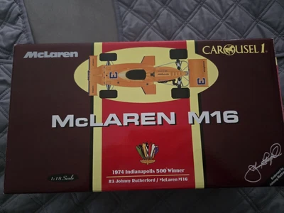 Johnny Rutherford 1974 Indy 500 Winner McLaren Carousel Autographed - Image 1 of 2