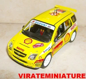 SUZUKI IGNIS S1600 19° RALLYE MONTE CARLO 2005 GUY WILKS IXO ALTAYA AU 1/43 - Foto 1 di 1