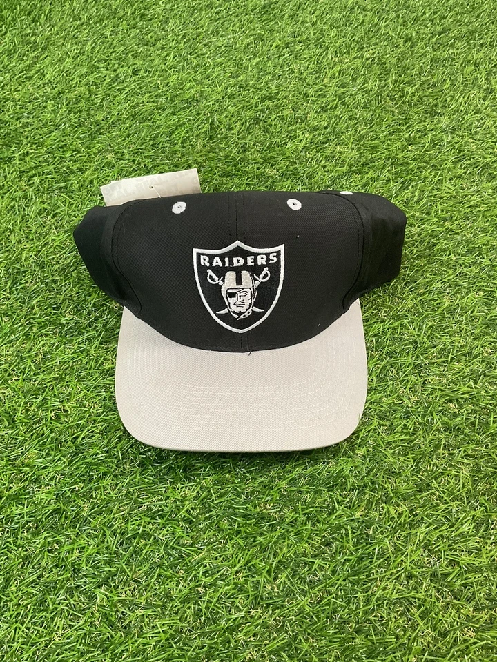 NUEVO CON ETIQUETAS De colección Raro NFL Los Angeles Raiders Logo Atlético Negro/Gris Snap Back Sombrero Foto 1 de 4