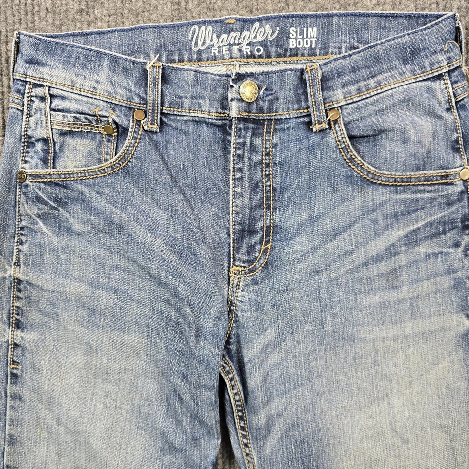 Pantalones de mezclilla Wrangler retro ajustados para hombre 30x34 azul elástico corte bootcut occidental Foto 1 de 4