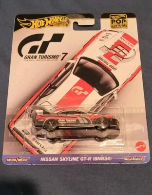 MATTEL Hot Wheels 1/64 Gran Turismo GT-R Nissan Skyline R34 Modellino Collezione - Immagine 1 di 3