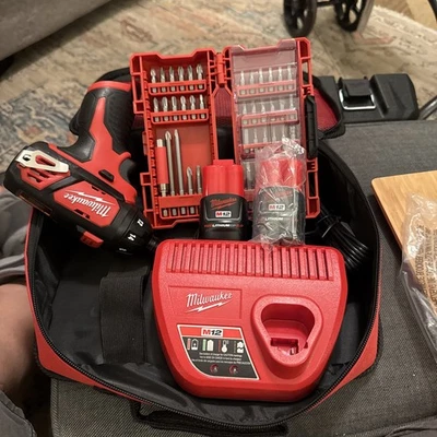 Milwaukee M12 1/4” Compct  Driver, 2 New 2.0ah Batt, Bit Set, & Carry Case - Image 1 of 4