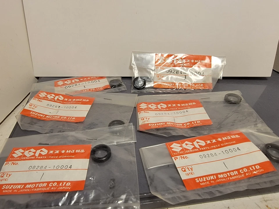 6 SELLO ANTIPOLVO TENSOR DE CADENA SUZUKI RM400/250/125/80/PE250/175/DR370 09284-10004 Foto 1 de 1