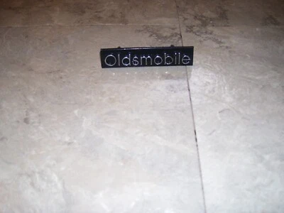 NOS 25529864 Front End Grille Emblem 1989-90 Oldsmobile 98 Regency 1990 Delta 88 - Image 1 of 3