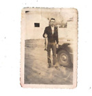 Photo Man Holding Large fish Standing Next to Old Car Cool Smoking