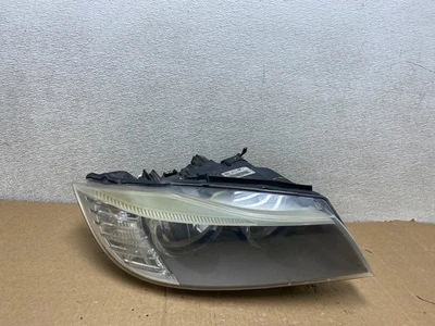 2009-2011 BMW 3 серии 328i 4/D седан фары галогенные правосторонние U9793 DW - Изображение 1 из 4