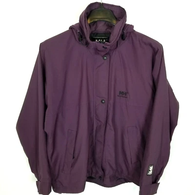 Chaqueta cortavientos de colección Helly Hansen para mujer talla M púrpura con capucha cremallera Foto 1 de 4