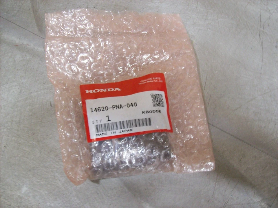 V1) Conjunto basculante original Honda OEM 14620-PNA-040 Foto 1 de 1