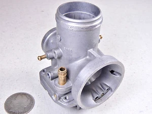 82 CAN-AM QUALIFIER IV 400 CARBURETOR BODY HOUSING - Picture 1 of 9