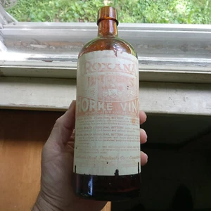 ROXANA MARCA MEDICINAL BITTERS CINCINNATI ETIQUETA SOLO BOTELLA ÁMBAR ESCASA - Imagen 1 de 12