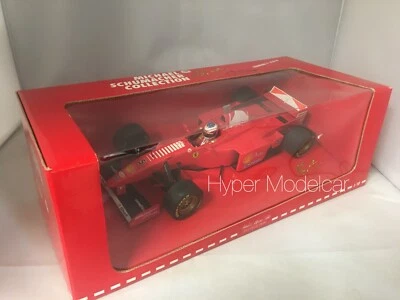 MINICHAMPS 1/18 FERRARI F 310 B #5 1997 M. SCHUMACHER Art.510971805 - Immagine 1 di 3