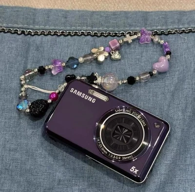 Samsung PL120 14MP 5x Zoom Óptico Doble Pantalla Cámara Inglés Púrpura Autodisparador Foto 1 de 4