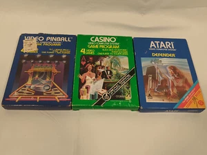 Atari 2600 Lot of 3 - Defender Casino Video Pinball all with Manuals - Picture 1 of 13