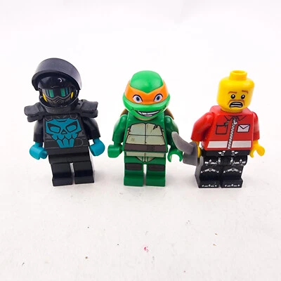 Lego Ladrillos Minfiguras Mini Figura Lote de 3 TMNT Miguel Ángel Sonriente Stuntz Driver Foto 1 de 4