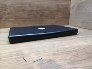 Apple Macbook A1181 schwarzer Laptop für Ersatzteile und Reparaturen - Bild 1 von 12