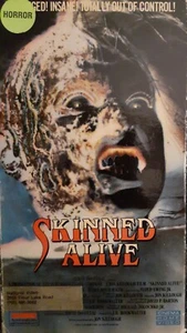 SKINNED ALIVE (VHS, 1990) CINEMA HOME VIDEO 1st VHS Release RARE REDNECK HORROR - Picture 1 of 3