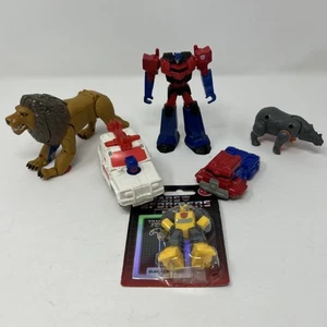 Acco And Transformers Figures: Lion, Red Alert, Rhinox, Bumble Bee, Optimus Prim - Picture 1 of 15