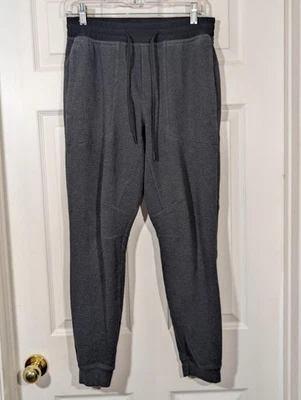 Pantalones de chándal Lululemon para hombre medianos negros grises a la facilidad texturizados doble tejido Foto 1 de 4