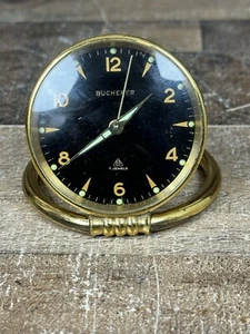 Reloj despertador de viaje Bucherer vintage cuerda estuche de cuero negro soporte latón brillante - Imagen 1 de 9