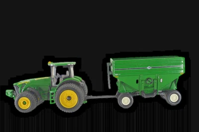 Tractor ERTL John Deere 8320R con carro J&M diecast 1/64 Foto 1 de 4