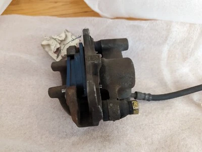 Pinza de freno izquierda conductor trasero Scion TC 2005 M1834 Foto 1 de 2