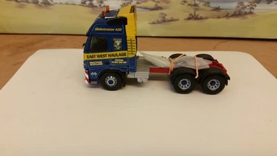 HEAVY HAULAGE CORGI EAST /WEST VOLVO 6X4 TRACTOR UNIT 1/50 SCALE - Image 1 of 4